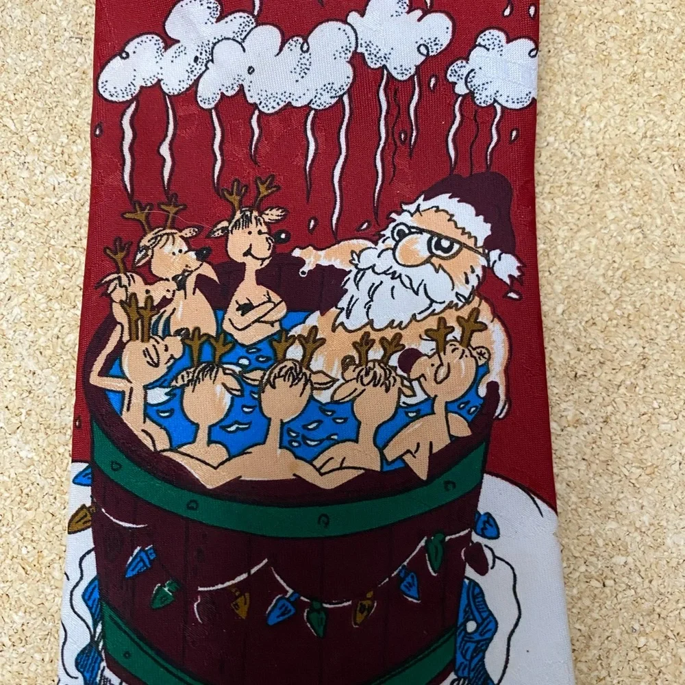 Santa Claus in the hot tub with‎ reindeer tie